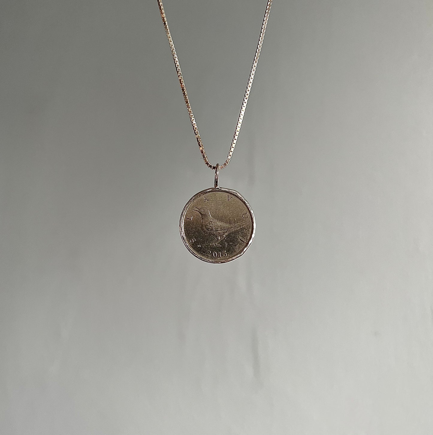 Free Bird Coin Pendant